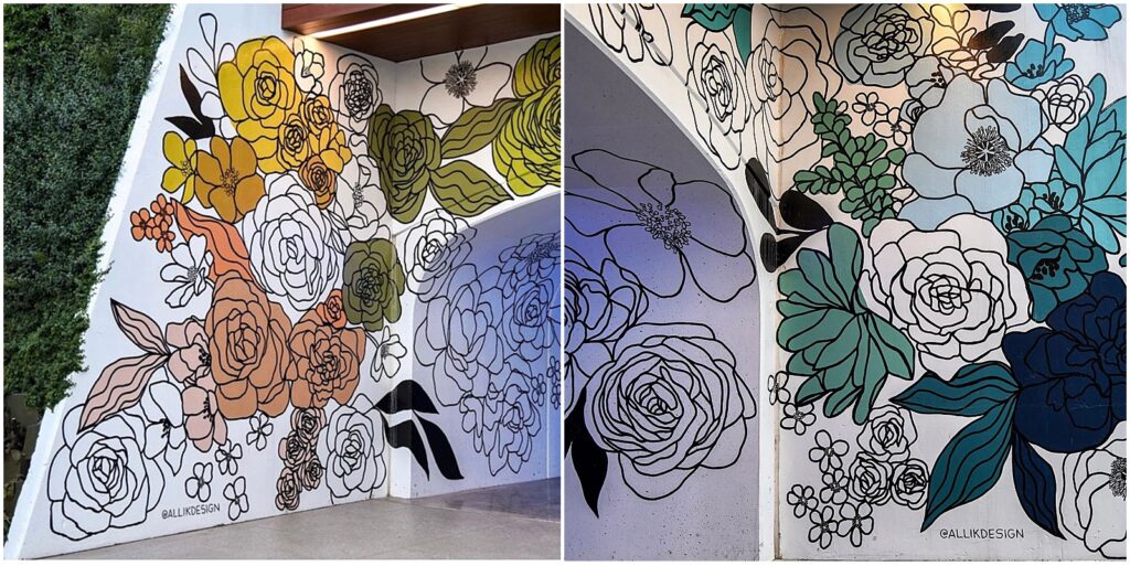 A colorful floral mural painted on a tunnel entrance by Alli Koch of Alli K Design