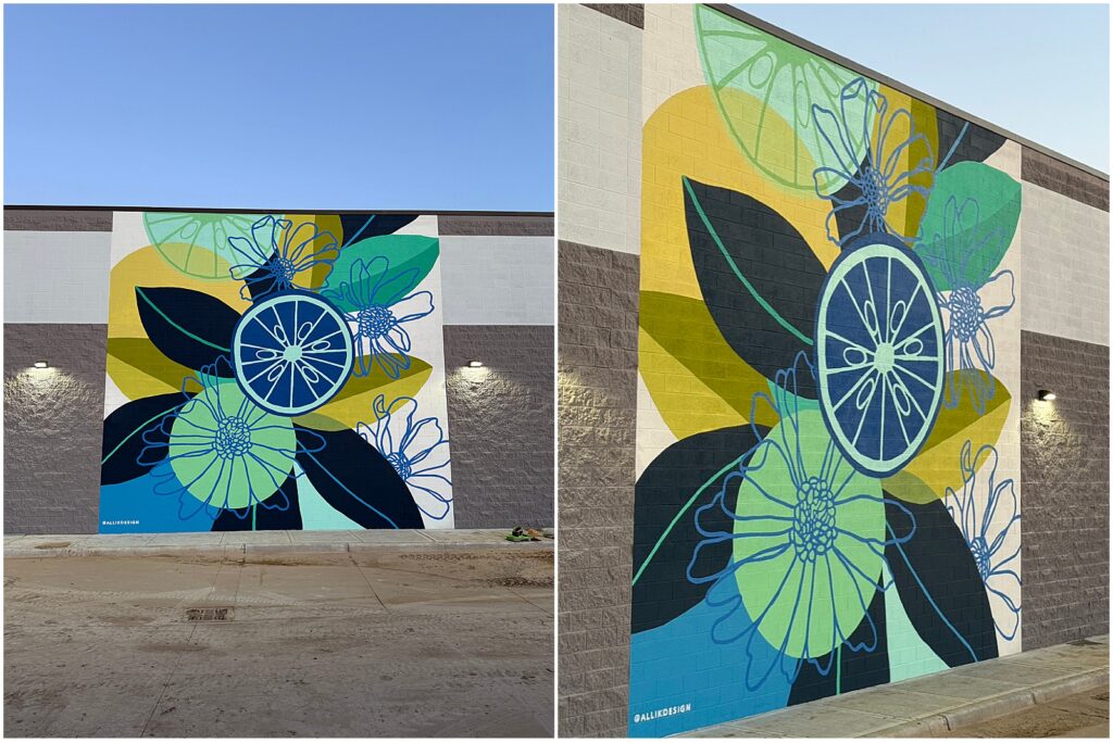 A mural of blue and teal oranges on the side of a Sprouts Farmers Market by Alli Koch, Texas muralist