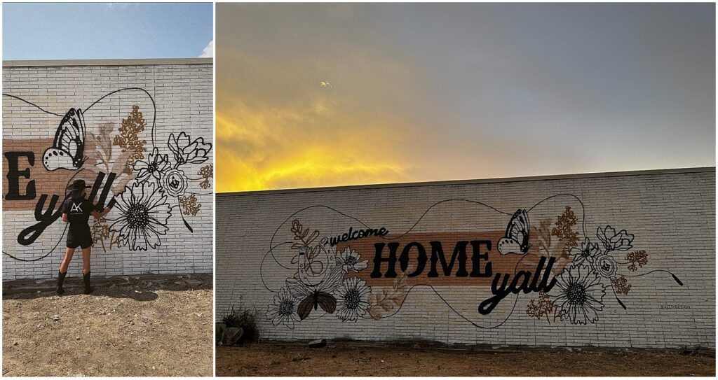 Welcome home yall mural on a brick wall with flowers and butterflies by Alli K Design
