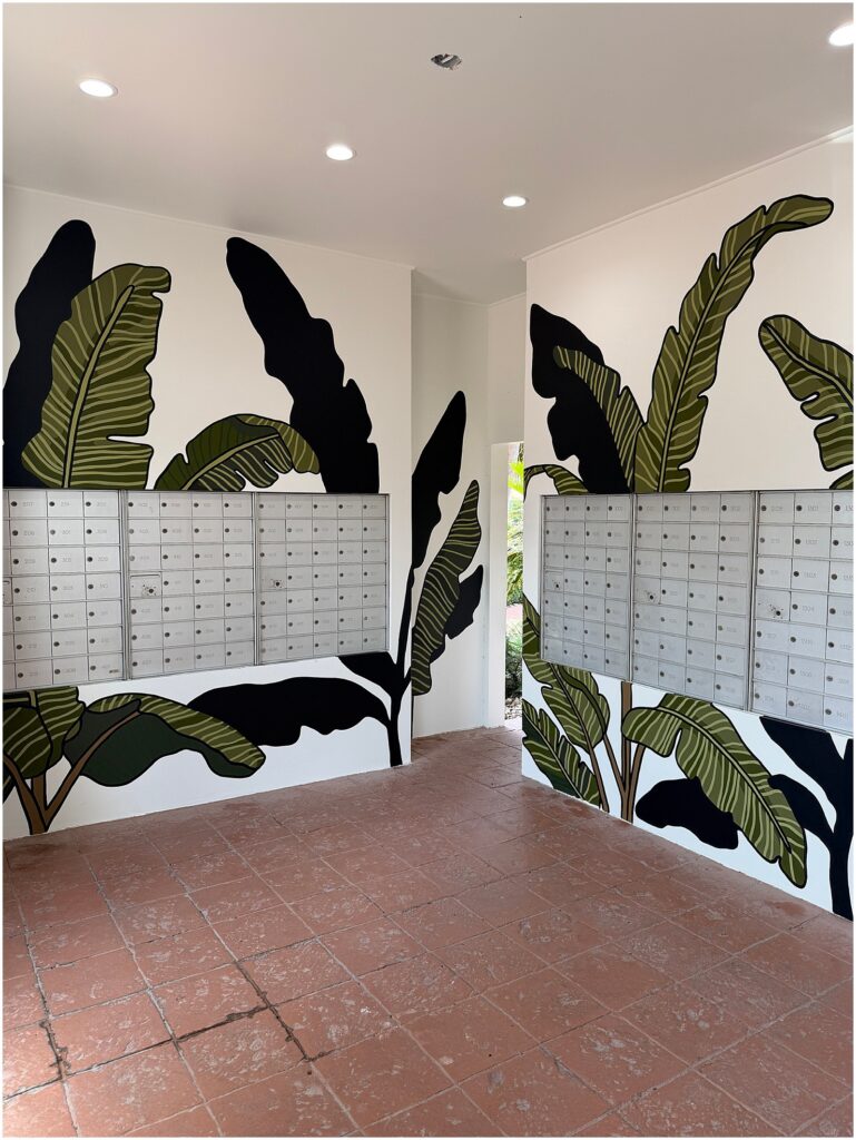 A Houston mural for an apartment complex's mailroom, painted by Alli K Design